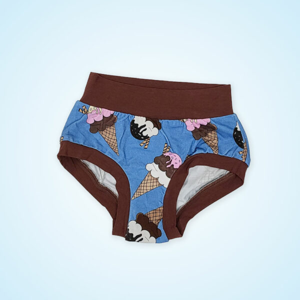 a pair of wunderundies briefs, children's underwear, with icecream on a blue gradient background